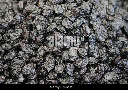 Dried plums close-up. Dried fruit. Stock Photo
