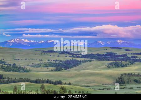 sunrise over the flint creek range above meadows in the upper spotted dog creek basin near avon, montana Stock Photo