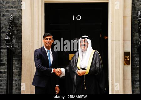 Prime Minister Rishi Sunak greets Crown Prince of Kuwait, Sheikh Meshal Al-Ahmad Al-Jaber Al-Sabah, outside 10 Downing Street, London, ahead of a meeting during his visit to the UK. Picture date: Tuesday August 29, 2023. Stock Photo