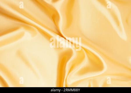 Beautiful Yellow Silk Or Satin Texture Background With Copy Space