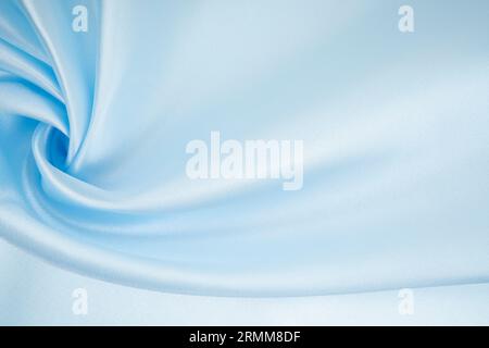Smooth elegant blue silk or satin luxury cloth texture can use as abstract background. Stock Photo