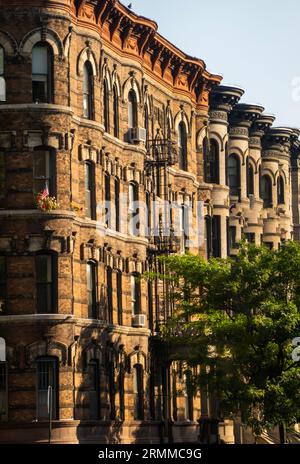 morning sunlight on buildings along Prospect park west in Park Slope Brooklyn NYC Stock Photo