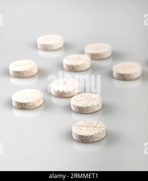 effervescent pill for disolving in a glass of water Stock Photo