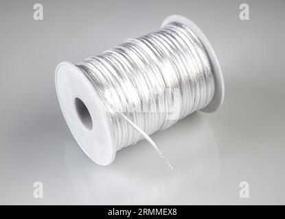 Twisted Cord spools or cotton rope. Studio shoot isolated on white background. Nautical Rope, Rope Reel Stock Photo