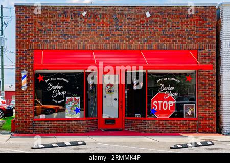 Ratt Pack Barbershop is pictured, Aug. 19, 2023, in Foley, Alabama. Rat pack often refers to a group of entertainers in the 1940s and 1950s. Stock Photo