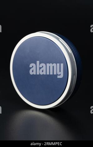 Blue sealed round cosmetic box perspective view isolated Stock Photo
