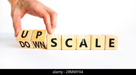 https://l450v.alamy.com/450v/2rmmyx4/upscale-or-downscale-symbol-concept-words-upscale-or-downscale-on-wooden-cubes-beautiful-white-table-white-background-businessman-hand-business-up-2rmmyx4.jpg