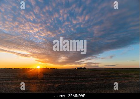 Colorful sheep clouds during sundown Stock Photo