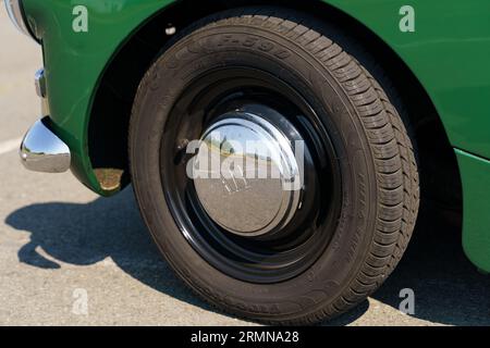 Waltershausen, Germany - June 10, 2023: A vintage Austin Healey Sprite Mark 4. View of the logo wheel. Stock Photo