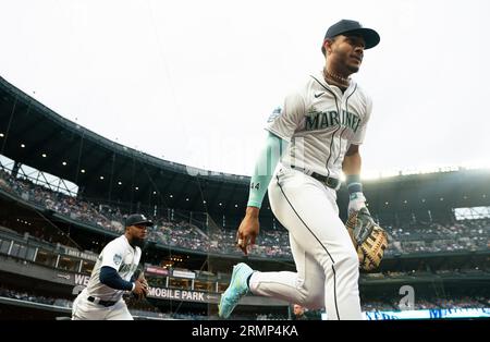 Seattle Mariners Teoscar Hernandez swings through while batting against the  Colorado Rockies during the third inning of a baseball game, Friday, April  14, 2023, in Seattle. (AP Photo/John Froschauer Stock Photo - Alamy