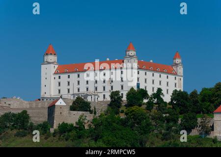 Bratislava, Slovakia. August 15, 2023. Bratislava Castle, rectangular building with four corner towers  on an rocky hill of the Little Carpathians abo Stock Photo