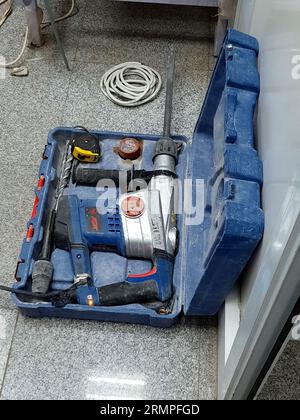Cairo, Egypt, August 24 2023: Hammer drill for concrete blocks, A drill is a tool used for making round holes or driving fasteners, Drills are commonl Stock Photo