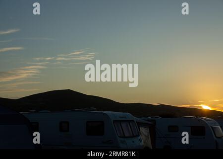 Sunset over Mynydd Mawr from a campsite at Aberdaron Stock Photo
