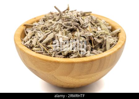 Dry Sage leaves. Dried salvia or sage leaves in wood bowl isolated on white background. herbal medicine Stock Photo