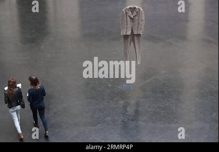 SANTIAGO, July 29, 2014 / People visit the exposition Joseph Beuys. Obras 1955-1985 , of German artist Joseph Beuys, at the Contemporary Art Museum (MAC, for its acronym in Spanish), in Santiago, capital of Chile, on July 29, 2014. (Xinhua/Jorge Villegas) (lyi) CHILE-SANTIAGO-GERMANY-CULTURE-EXPOSITION PUBLICATIONxNOTxINxCHN   Santiago July 29 2014 Celebrities Visit The Exposure Joseph Beuys Obras 1955 1985 of German Artist Joseph Beuys AT The Contemporary Art Museum Mac for its acronym in Spanish in Santiago Capital of Chile ON July 29 2014 XINHUA Jorge Villegas lyi Chile Santiago Germany Cul Stock Photo