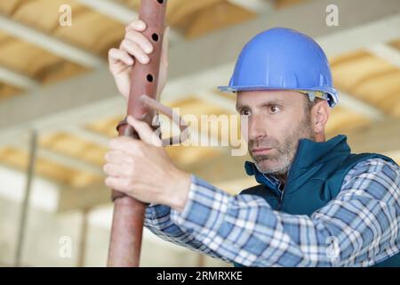 engineer works on water supply system Stock Photo