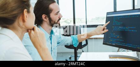 Professional development programers programming game software or developing code for shopping online financial data security system network working at Stock Photo