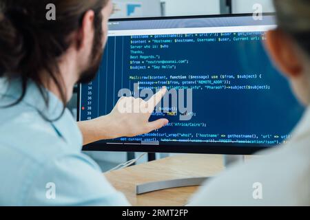 Professional development programers programming game software or developing code for shopping online financial data security system network working at Stock Photo