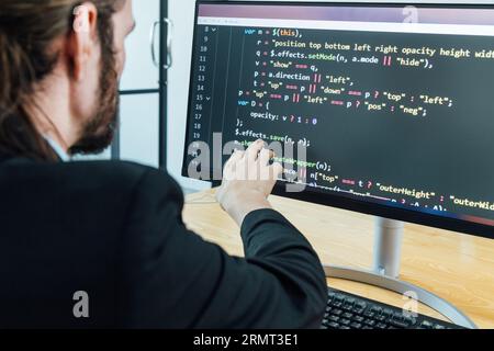 Professional development programer programming game software or developing code for shopping online financial data security system network working at Stock Photo
