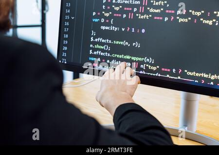Professional development programer programming game software or developing code for shopping online financial data security system network working at Stock Photo