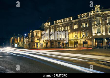 Traffic on Belgrade night street. Light trails of cars driving on street in historical centre of Belgrade and night city illumination captured with lo Stock Photo
