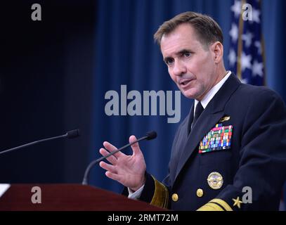 (140819)-- WASHINGTON D.C., Aug. 19, 2014 -- U.S. Department of Defense (DOD) Press Secretary Navy Rear Adm. John Kirby speaks during a briefing at the Pentagon in Washington D.C., capital of the United States, Aug. 19, 2014. The U.S. partnership with Iraqi and Peshmerga forces was critical to the success of the operation to retake the Mosul Dam from Sunni extremists of the Islamic State of Iraq and the Levant (ISIL), John Kirby said on Tuesday. ) US-WASHINGTON-PENTAGON-BRIEFING BaoxDandan PUBLICATIONxNOTxINxCHN   Washington D C Aug 19 2014 U S Department of Defense Dod Press Secretary Navy Re Stock Photo