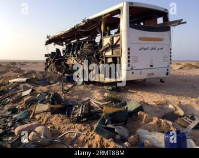(140822) -- CAIRO, Aug. 22, 2014 -- Photo taken on Aug. 22, 2014 shows the wreckage of a bus in Egypt s South Sinai province. At least 33 people were killed and over 40 others seriously wounded in the early hours of Friday as two buses collided on a highway some 50 km away from Red Sea resort city Sharm El-Sheikh in Egypt s South Sinai province, a security source told Xinhua. ) EGYPT-CAIRO-SINA-ACCIDENT STR PUBLICATIONxNOTxINxCHN   Cairo Aug 22 2014 Photo Taken ON Aug 22 2014 Shows The wreckage of a Bus in Egypt S South Sinai Province AT least 33 Celebrities Were KILLED and Over 40 Others SERI Stock Photo