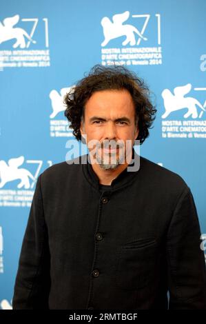 (140827) -- VENICE, Aug. 27, 2014 -- Director Alejandro Gonzalez Inarritu poses during the photo call for the movie Birdman at the 71st Venice Film Festival August 27, 2014. ) ITALY-VENICE-FILM FESTIVAL-BIRDMAN-PHOTOCALL LiuxLihang PUBLICATIONxNOTxINxCHN   140827 Venice Aug 27 2014 Director Alejandro Gonzalez Inarritu Poses during The Photo Call for The Movie Birdman AT The 71st Venice Film Festival August 27 2014 Italy Venice Film Festival Birdman photo call LiuxLihang PUBLICATIONxNOTxINxCHN Stock Photo