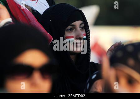 (140829) -- ISLAMABAD, Aug. 28, 2014 -- Supporters of religious leader Tahir-ul-Qadri gather in an anti-government protest in front of the parliament building in Islamabad, capital of Pakistan, on Aug. 28, 2014. Two opposition leaders, whose supporters have staged sit-ins against the government of Prime Minister Nawaz Sharif, on Thursday disclosed that the army has offered mediation to end the ongoing political tensions in the country. ) PAKISTAN-ISLAMABAD-PROTEST-ARMY AhmadxKamal PUBLICATIONxNOTxINxCHN   Islamabad Aug 28 2014 Supporters of Religious Leader Tahir UL Qadri gather in to Anti Gov Stock Photo