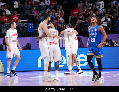 Okinawa, Japan. 30th Aug, 2023. Georgia's players celebrate winning the group F first round match between Georgia and Venezuela at the FIBA World Cup 2023 in Okinawa, Japan, Aug. 30, 2023. Credit: Zhang Xiaoyu/Xinhua/Alamy Live News Stock Photo