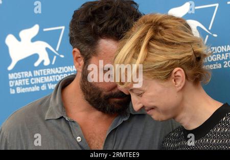 (140831) -- VENICE, Aug. 31, 2014 -- Director Saverio Costanzo (L) and actress Alba Rohrwacher pose during the photo call for Hungry Hearts which is selected for the main competition during the 71th Venice Film Festival, in Lido of Venice, Italy on Aug. 31, 2014. Liu Lihang) ITALY-VENICE-FILM FESTIVAL-PHOTO CALL-HUNGRY HEARTS Ymerali,xLiuxLihang PUBLICATIONxNOTxINxCHN   Venice Aug 31 2014 Director Saverio Costanzo l and actress Alba Rohrwacher Pose during The Photo Call for Hungry Hearts Which IS Selected for The Main Competition during The 71th Venice Film Festival in Lido of Venice Italy ON Stock Photo