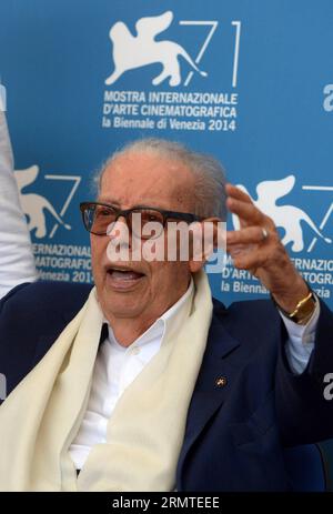 (140831) -- VENICE, Aug. 31, 2014 -- Gianluigi Rondi, the President of the Venice Biennale poses during the photo call for the documentary Vita Cinema Passione for the Venice Classics during the 71th Venice Film Festival, in Lido of Venice, Italy on Aug. 31. 2014. ) ITALY-VENICE-FILM FESTIVAL-PHOTO CALL-GIANLUIGI RONDI LiuxLihang PUBLICATIONxNOTxINxCHN   Venice Aug 31 2014 Gianluigi Rondi The President of The Venice Biennial Poses during The Photo Call for The Documentary Vita Cinema Passione for The Venice Classics during The 71th Venice Film Festival in Lido of Venice Italy ON Aug 31 2014 It Stock Photo