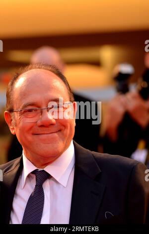 (140831) -- VENICE, Aug. 31, 2014 -- Competition unit jury member and Italian actor Carlo Verdone poses during the 71th Venice Film Festival, in Lido of Venice, Italy on Aug. 31, 2014. ) ITALY-VENICE-FILM FESTIVAL-HUNGRY HEARTS XuxNizhi PUBLICATIONxNOTxINxCHN   Venice Aug 31 2014 Competition Unit Jury member and Italian Actor Carlo Verdone Poses during The 71th Venice Film Festival in Lido of Venice Italy ON Aug 31 2014 Italy Venice Film Festival Hungry Hearts  PUBLICATIONxNOTxINxCHN Stock Photo