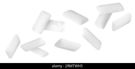 Many chewing gum pads falling on white background Stock Photo