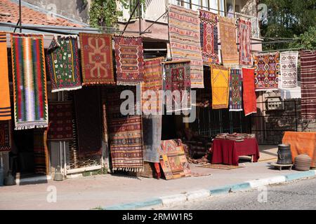 Bergama, Izmir, Turkey Carpet weaver, traditional handmade rug. Traditional Turkish rug weaving Stock Photo