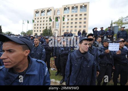 (141015) -- ALGIERS, Oct. 15, 2014 () -- Algerian policemen take part in a public protest near the Presidential Palace in Algiers, capital of Algeria, on Oct. 15, 2014, to support a police demonstration over working conditions. About 1,500 policemen took part in the demonstration over working conditions on Oct. 13, 2014 in Ghardaia where clashes have been taking place for months between Arabs and Berbers. () ALGERIA-ALGIERS-POLICEMEN-PROTEST Xinhua PUBLICATIONxNOTxINxCHN   Algiers OCT 15 2014 Algerian Policemen Take Part in a Public Protest Near The Presidential Palace in Algiers Capital of Al Stock Photo