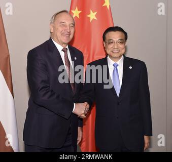 (141017) -- MILAN, Oct. 17, 2014 -- Chinese Premier Li Keqiang (R) meets with Latvia s President Andris Berzins, in Milan, Italy, Oct. 17, 2014. )(wyl) ITALY-MILAN-LI KEQIANG-LATVIA-MEETING LixXueren PUBLICATIONxNOTxINxCHN   Milan OCT 17 2014 Chinese Premier left Keqiang r Meets With Latvia S President Andris Berzins in Milan Italy OCT 17 2014  Italy Milan left Keqiang Latvia Meeting LixXueren PUBLICATIONxNOTxINxCHN Stock Photo