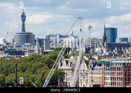 View cross London to the west fro Blackfriars, the BT Tower in the background, cranes from a construction site in the foreground, London, UK Stock Photo