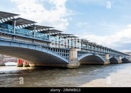 Blackfriars railway bridge and station on the River Thames, London, UK Stock Photo