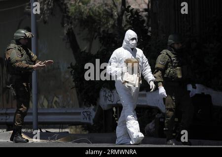 (141106) -- SANTIAGO, Nov. 6, 2014 -- Members of the Police Special Operations Group (GOPE, for its acronym in Spanish) work in the area where an explosive device was located between San Jaoquin and Pedrero subway stations, in Santiago, capital of Chile, on Nov. 6, 2014. GOPE members found an explosive device in one of the pillars located between San Jaoquin and Pedrero Line 5 subway stations. The subway service was suspended for 45 minutes and vehicular traffic was also affected in the nearby routes. Hans Scott/AGENCIA UNO) (jg) CHILE-SANTIAGO-SECURITY-OPERATION e AGENCIAxUNO PUBLICATIONxNOTx Stock Photo