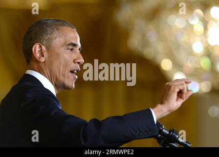 (141107) -- WASHINGTON D.C., U.S. President Barack Obama speaks at a press conference in the East Room of the White House, in Washington D.C., the United States, Nov 5, 2014. Obama has authorized the military to send up to 1,500 additional personnel to Iraq for training and assistance of Iraqi forces with the aim to enforce fight against the Islamic State (IS), according to a statement released by U.S. Department of Defense Friday. ) US-WASHINGTON-TROOPS-IRAQ-AUTHORIZED-OBAMA YinxBogu PUBLICATIONxNOTxINxCHN   Washington D C U S President Barack Obama Speaks AT a Press Conference in The East Ro Stock Photo