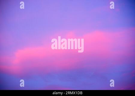 Abstract cloud sky background. Purple pink and blue tone gradient background, at the sunrise moment in the morning. Stock Photo