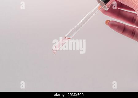 Precision in Progress: Scientific Experimentation with Dropper Stock Photo