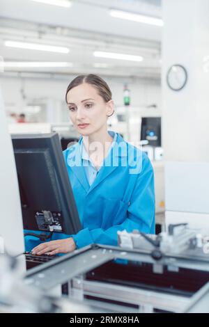 electrical engineer working in electronics manufacturing Stock Photo