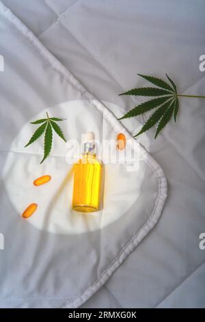 CBD oil, cannabinoid sleeping pill to improve sleep, calmness in moonlight Stock Photo