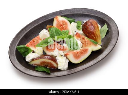 fig caprese salad(fig, mozzarella and basil) isolated on white background Stock Photo