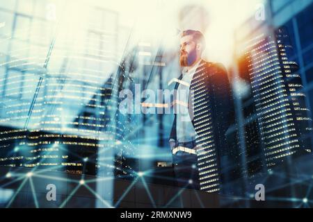 Thoughtful hipster businessman in the office. Double exposure effects Stock Photo