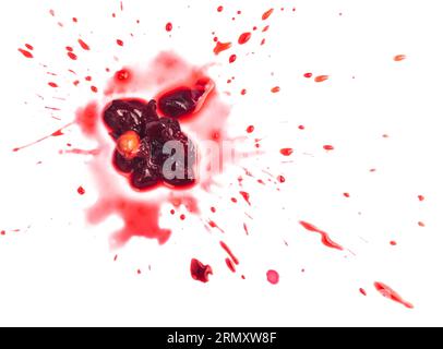 Squashed ripe sour cherry in the puddle of red juice isolated on white Stock Photo