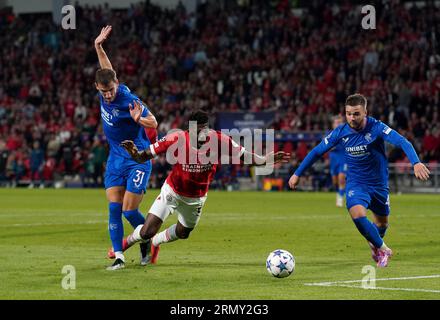 Rangers' Borna Barisic (left) and PSV Eindhoven's Ibrahim Sangare battle for the ball during the UEFA Champions League play-off second leg match at the Philips Stadium, Eindhoven. Picture date: Wednesday August 30, 2023. Stock Photo