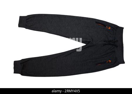 dark gray sports pants for boy isolated on white background Stock Photo